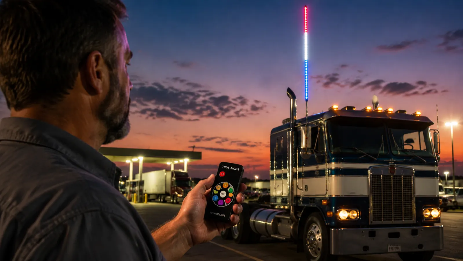 Wire routing path along a semi truck frame showing power cable running from the LED whip base down through a rubber grommet into the cab